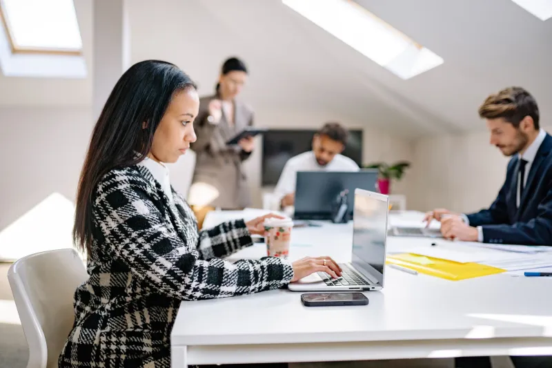 Declared Distributed, Functionally Anchored: The Hidden Cost of Half-Committed Hybrid Work in Enterprise Digital Delivery